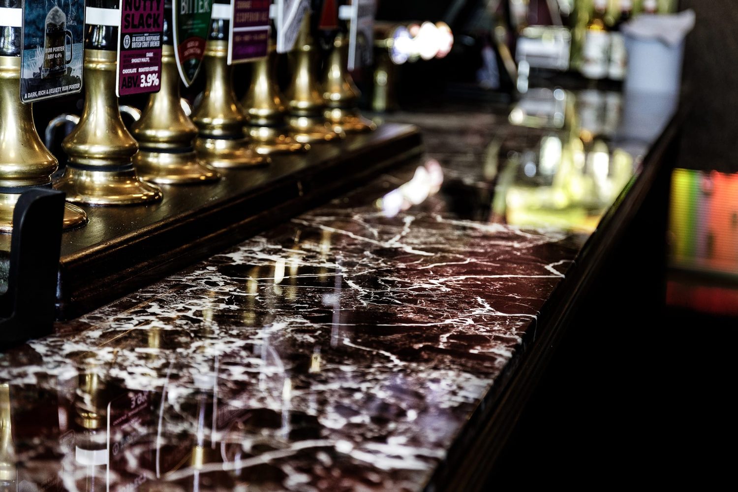 Dark brown and white marble bar countertop