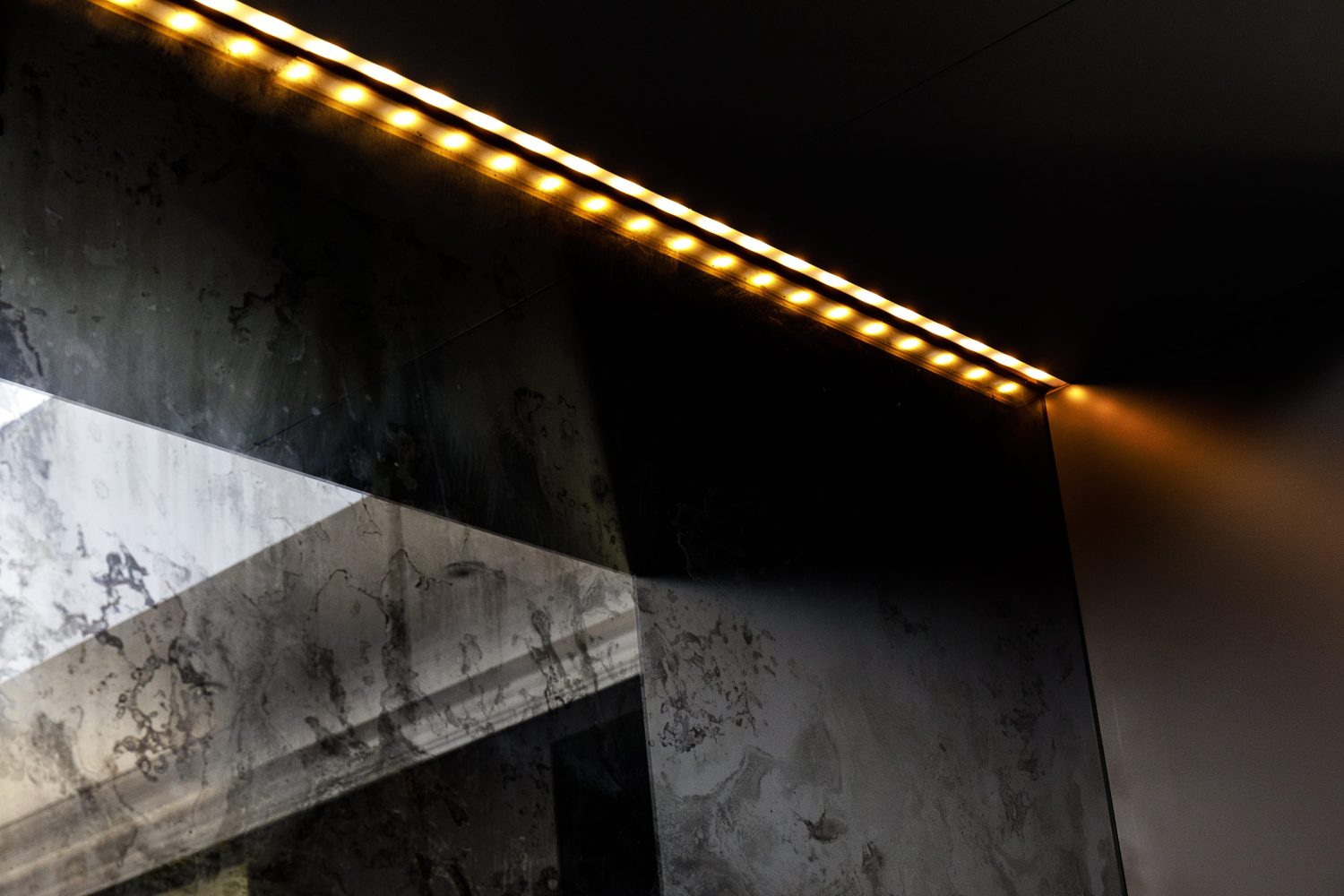 Close up antique mirror will strip of lights surrounding