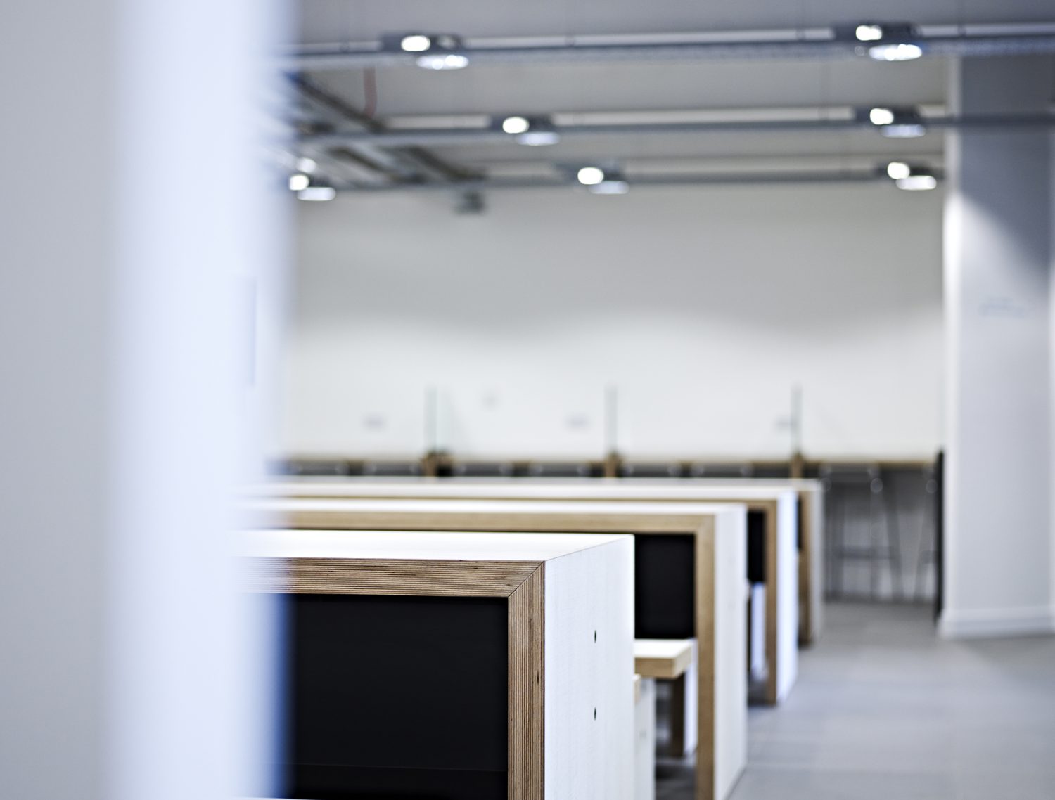 The edge of white tables in a row