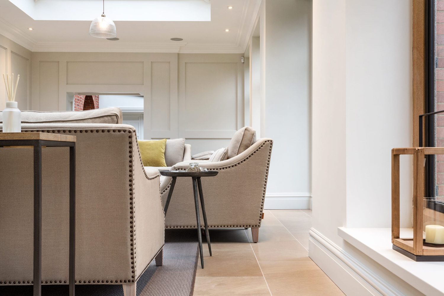 Side view of beige sofas in a home
